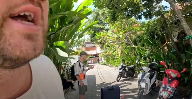 An image showing Mashtag filming his raffle winner in Bali